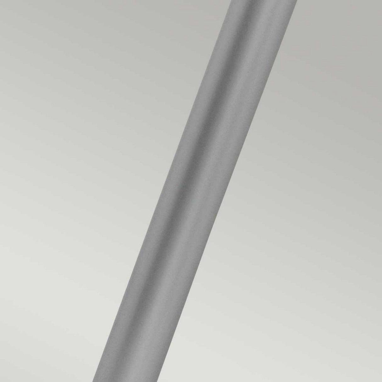 Helsingor 1 Light Bollard Lantern in silver set against a light gray background, embodying Scandinavian minimalism.