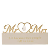 Cream and gold MDF mantel plaque with gold script, an open heart and crystal drop, reading All because two people fell in Love, on a white background.
