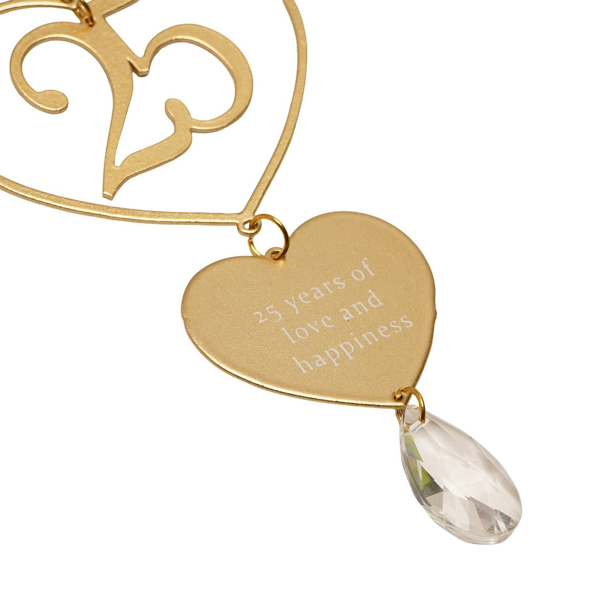 Gold metal hanging plaque with an open heart framing a cut-out 25, a solid heart reading "25 years of love and happiness," and a clear faceted teardrop, on a white background.