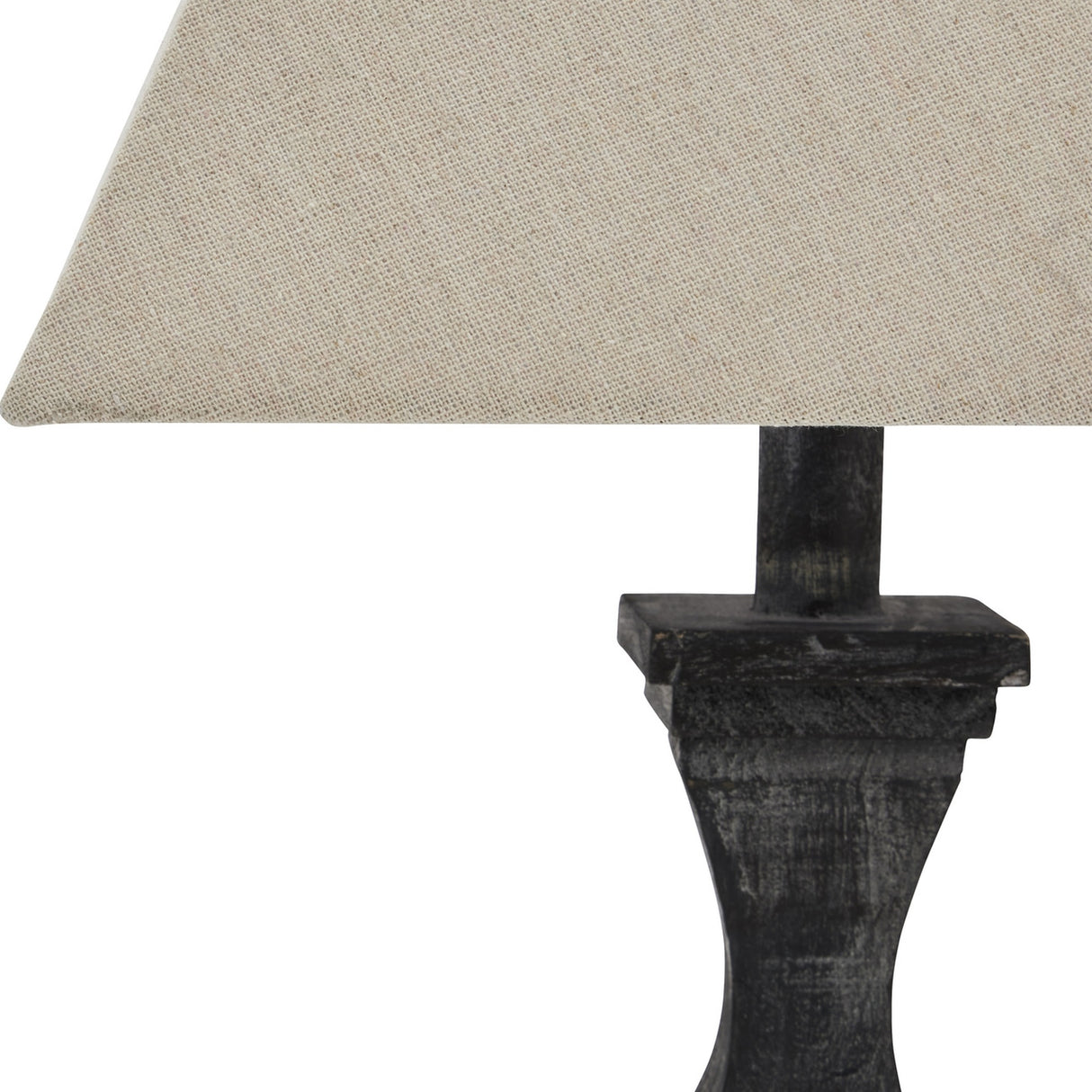 Close-up of the Hill Interiors Ormelle Fluted Wooden Table Lamp in grey-washed wood, showing the carved base detail and natural linen drum shade.