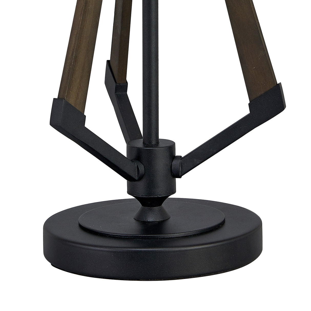 Close-up of the Hilton 1 Light Wood Table Lamp - Black & Grey Without Shade, showing its round black base and three angled legs in dark wood and black metal converging at the center for a striking geometric design.