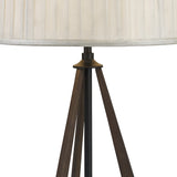 A close-up of the Hilton 1 Light Wood Table Lamp in black and grey with a cream pleated shade, featuring three dark wooden legs, displayed against a plain white background.