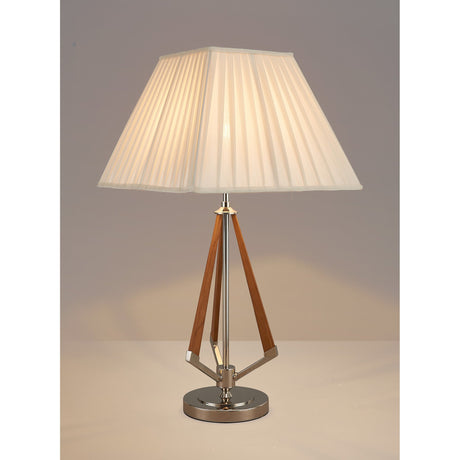 The Hilton 1 Light Wood Table Lamp features a modern geometric design with a nickel and taupe finish, wooden and metal accents, and an ivory pleated shade—perfect for adding style to any neutral space.