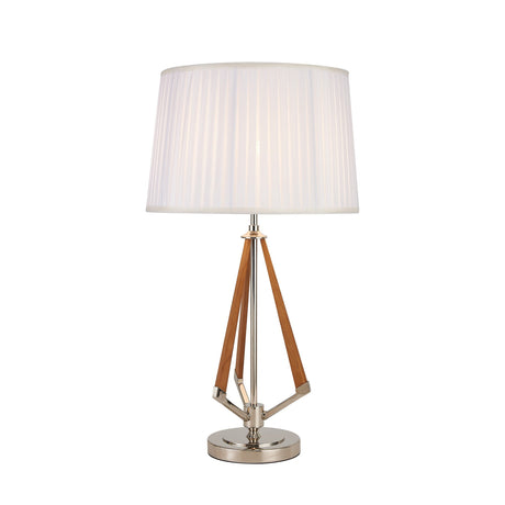 The Hilton 1 Light Wood Table Lamp features a nickel and taupe finish with wood accents and a white pleated shade, showcasing a modern triangular design on the stand.