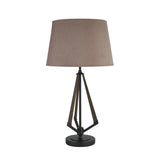 The Hilton 1 Light Wood Table Lamp features a black and grey base with a taupe/halo gold shade, creating a modern geometric accent ideal for adding warm, neutral style to contemporary interiors.