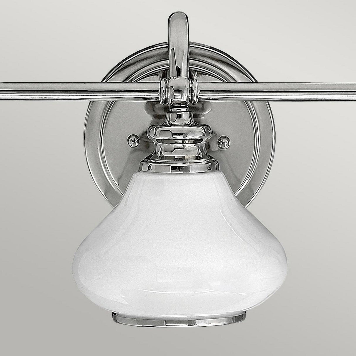 The Ainsley 3 Light Wall Light in polished chrome is an elegant and modern wall-mounted light fixture featuring opal glass shades and energy-efficient LED lamps.