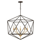 The Astrid 5 Light Chandelier - Matte Bronze & Gold showcases a geometric design with a black metal frame and five exposed light bulbs on gold-toned arms. Suspended from a chain, its modern style resembles a matte bronze and gold 3D polygon, offering both elegance and sophistication.