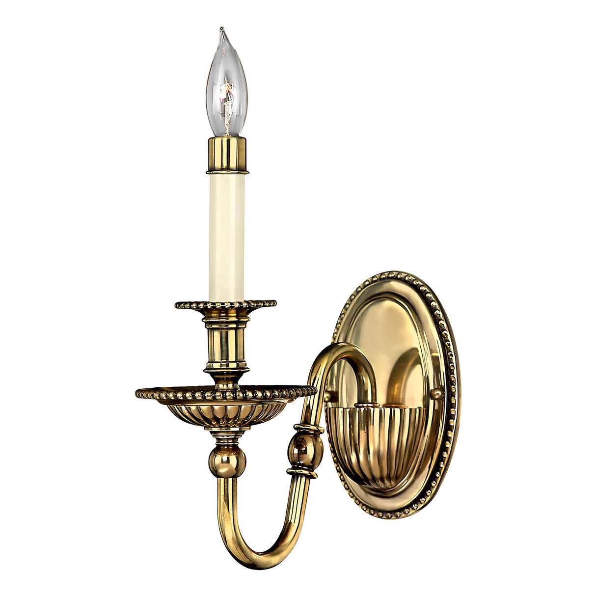 The Cambridge 1 Light Wall Light in Burnished Brass features a candle-style bulb on a curved arm, mounted on an oval backplate. It boasts intricate detailing, exuding elegant and vintage appeal while capturing classic New England charm.