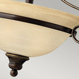 A close-up of the Cello 2 Light Semi Flush fixture in beige, featuring a bowl-shaped design with an antique bronze metal rim reminiscent of vintage faux alabaster glass. The traditional design highlights elegant curves and a smooth finish, perfectly suspended against a neutral background.