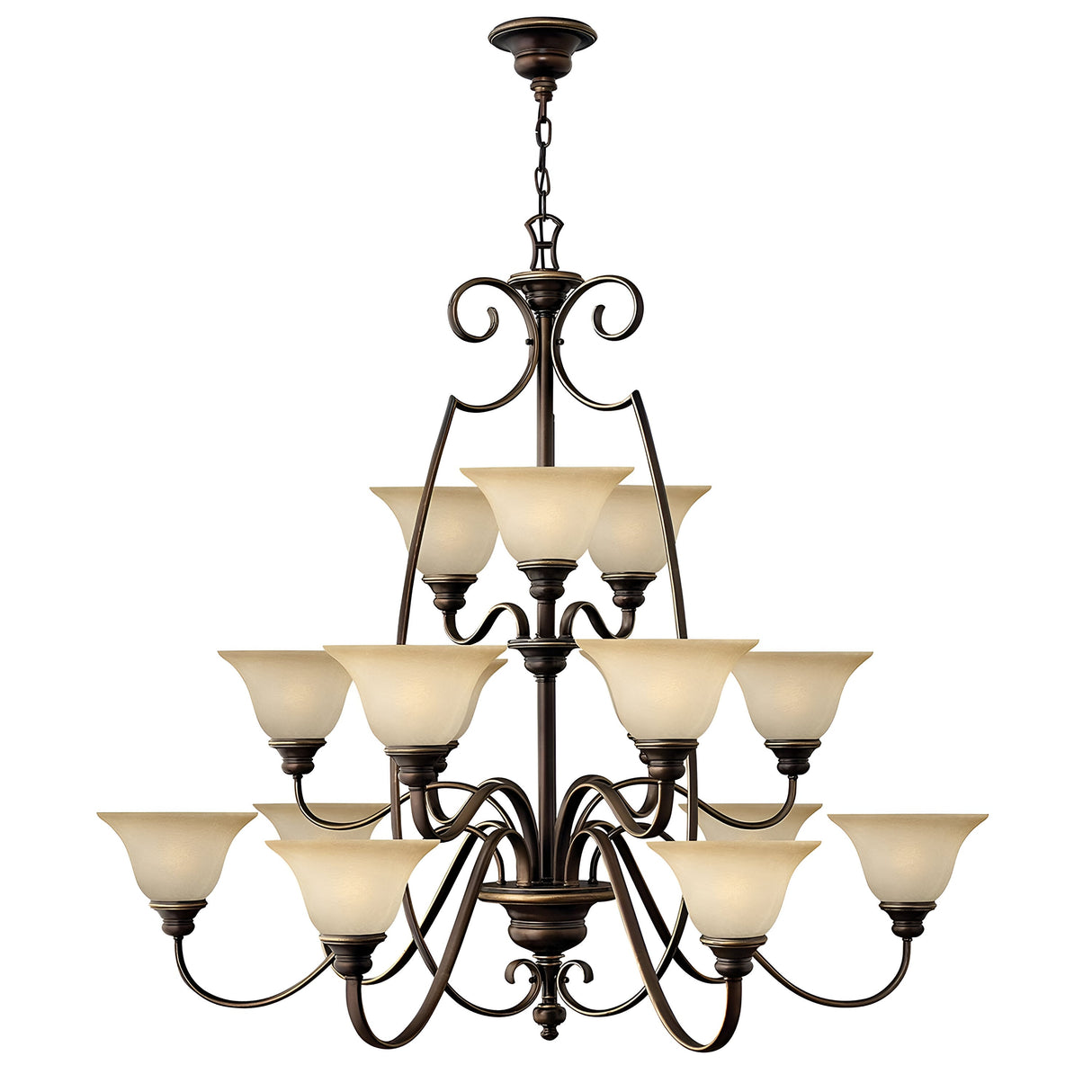 The Cello 15 Light Chandelier in Antique Bronze is a large and elegant fixture with two tiers of vintage faux alabaster glass lampshades. It features intricate scrollwork details and is suspended from a decorative chain.