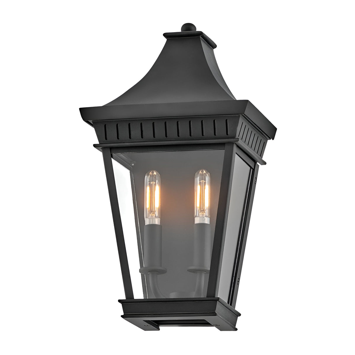 The Chapel Hill 2 Light Outdoor Half Wall Lantern in black features a classic tapered design with clear glass panels and two candle-style bulbs, creating a warm, welcoming glow for your homes exterior.
