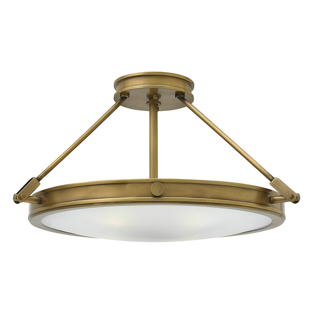 The Collier 4 Light Large Semi Flush in Heritage Brass exhibits a contemporary design with a round, frosted glass diffuser. It is supported by three angled rods connected to a circular mount, embodying the sleek and elegant style characteristic of the collection.