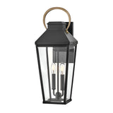 The Dawson 1 Light Outdoor Large Wall Lantern in Black Oxide features a rectangular glass enclosure, two candle-style bulbs, and a gold handle—perfect exterior lighting for any home.