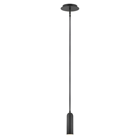 The Dax LED Mini Pendant - Black features a sleek, cylindrical shade and hangs from an extended cord. Set against a plain white backdrop, it highlights its modern and minimalistic design while delivering energy-efficient lighting.