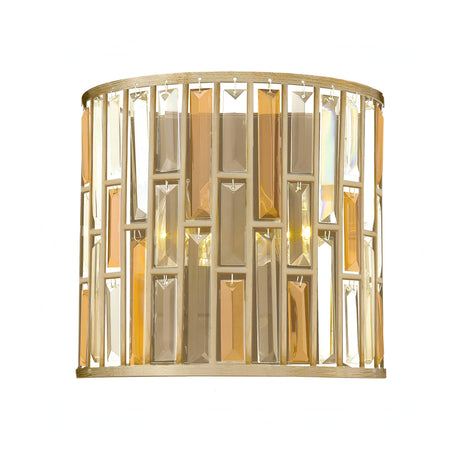 The Gemma-1 2 Light Wall Light - Gold is a decorative sconce with an elegant, geometric design. It showcases a gold finish frame accented with rectangular, colored glass panels that beautifully reflect light, creating a warm and inviting ambiance complemented by the subtle glow of amber pearl crystal accents.