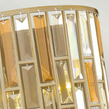 Close-up of the Gemma-1 2 Light Wall Light - Gold, showcasing its rectangular amber and clear glass panels arranged in a geometric pattern. Gentle light filters through, casting a warm and elegant glow.