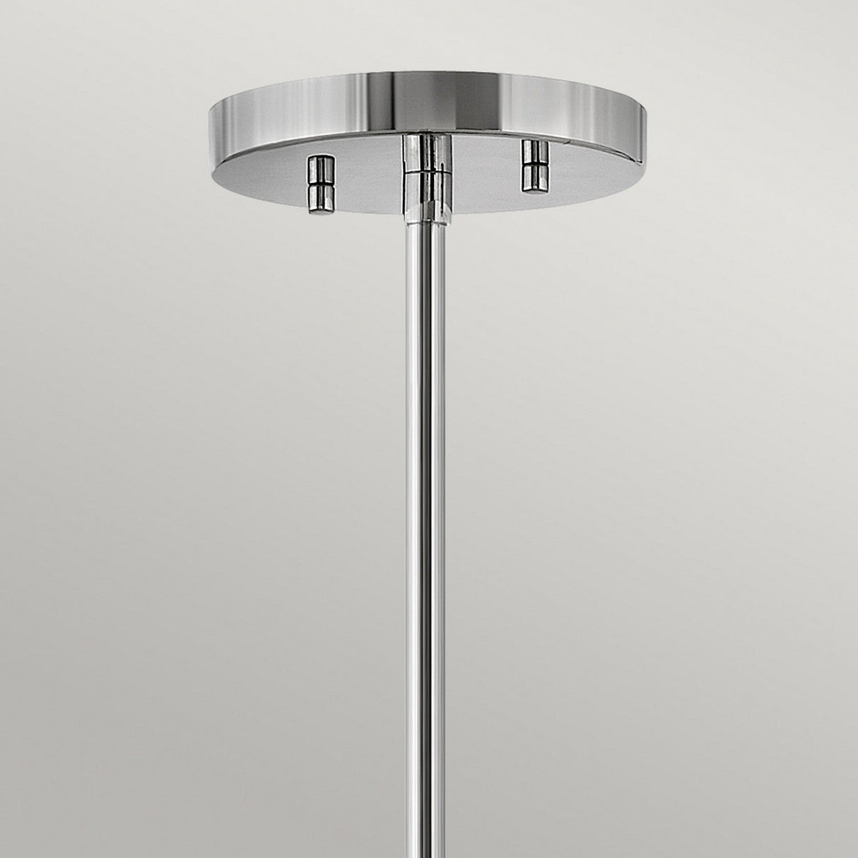 A close-up view of the Graham 4 Light Duo-Mount Pendant/Semi-Flush in a sleek polished nickel finish, featuring three small screws. This minimalist design, perfect for a pendant light setup, is attached to a straight metal rod extending downward.