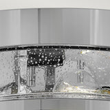 Close-up of the Harper 3 Light Flush in polished chrome with clear seeded glass. Water droplets create a pattern across its curved, reflective surface, adding texture and depth. The sleek metallic finish exudes modernity, enhanced by a subtle sheen.