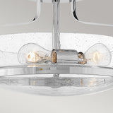 Product close-up of the Harper 3 Light Small Semi Flush, featuring two exposed bulbs within a clear, seeded glass dome. The fixture is elegantly finished in polished chrome, and the glass is adorned with small bubble-like patterns for enhanced appeal.