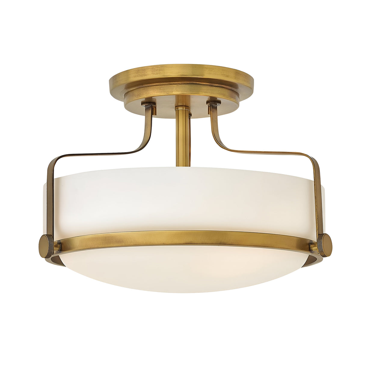 The Harper 3 Light Small Semi Flush in Heritage Brass features an opal etched glass shade with a circular design. Its modern and elegant look is accentuated by two curved metal supports connecting the base to the shade.