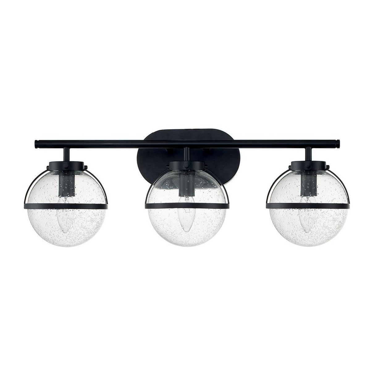 The Hollis 3 Light Wall Light in black with clear glass showcases a contemporary Art Deco style. It features three globe lampshades made of clear glass, mounted on a horizontal black bar. Each globe encases a filament bulb that highlights its sleek and elegant design.