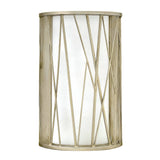 The Nest 1 Light Wall Light offers organic modern elegance with its cylindrical design featuring a linen glass center. Its decorative metal frame showcases abstract, angular lines and flaunts a gold finish that exudes contemporary charm.