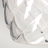 Close-up of the Plantation Outdoor 1 Light Wall Light in Polished Antique Nickel, featuring a pineapple-shaped optic glass surface with a crisscross pattern. The light reflects off the glass, creating highlights and subtle shadows on a neutral gray background.