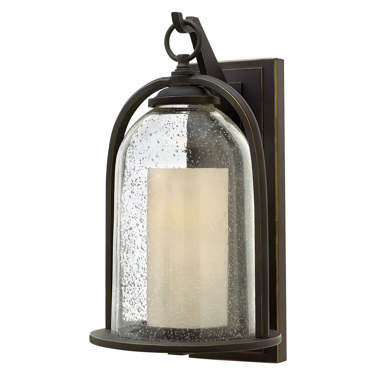 The Quincy Outdoor 1 Light Medium Wall Lantern features an oil-rubbed bronze frame with a traditional design. It includes a clear, speckled glass cover surrounding a white cylindrical bulb, providing an elegant vintage appeal. The die-cast aluminium construction ensures both durability and style.