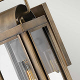 Close-up view of the Sag Harbor Outdoor 1 Light Small Wall Lantern in a painted burnished bronze finish, featuring glass panels with a visible bulb inside. This IP44 rated design showcases clean lines and a classic aesthetic, perfect for exterior lighting.