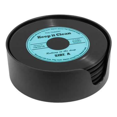 Set of 6 glass record coasters in a round black holder, top coaster featuring a turquoise "Keep it Clean" label with grooved black vinyl design, on a white background.
