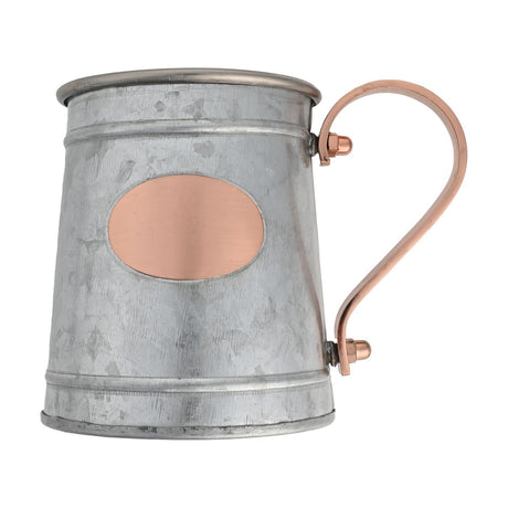 Blank Moscow Mule iron mug in mottled silver-grey finish with a curved copper-tone handle and blank oval plaque, shown on a plain white background.