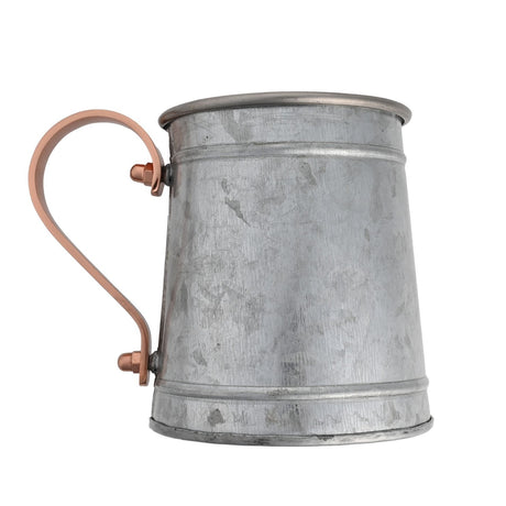 Blank Moscow Mule iron mug in mottled silver-grey finish with curved copper-tone handle and rolled rim, shown on a plain white background.