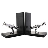 Pair of black L-shaped bookends with shiny silver metal Spitfire aircraft models mounted on curved stands, set against a plain white background.