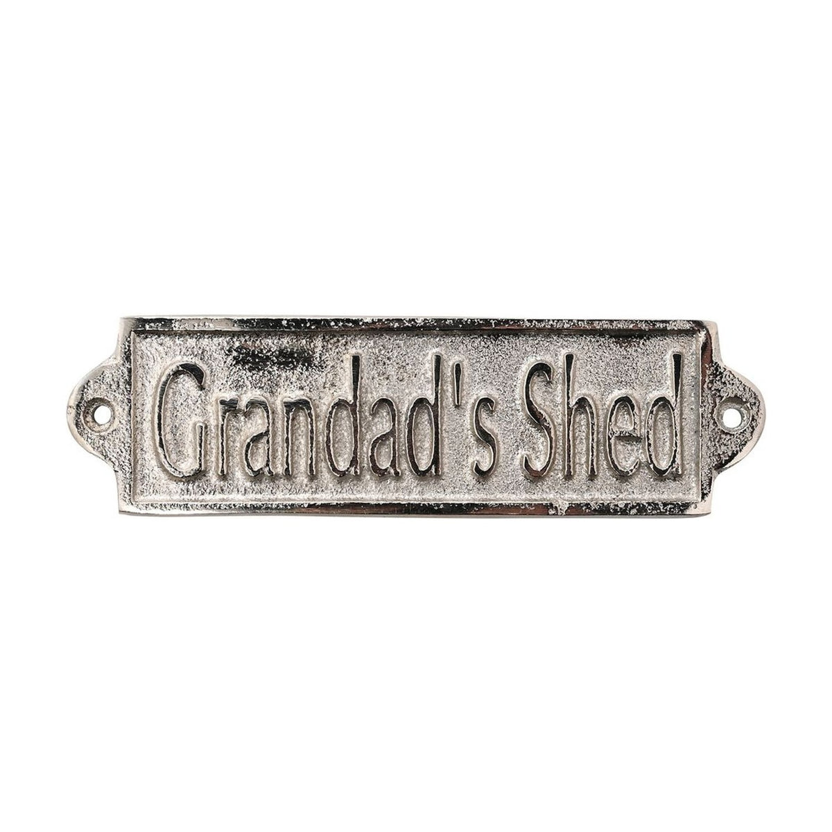 Rectangular silver metal wall plaque reading "Grandad's Shed" in raised lettering, with a weathered finish and rounded fixing tabs, shown on a plain white background.