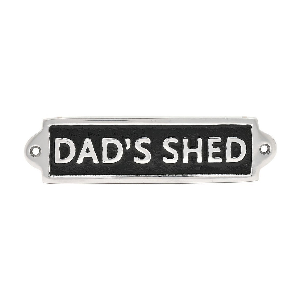 Rectangular metal wall plaque reading "DAD'S SHED" in raised silver capitals on a black panel with a silver border and two fixing holes, shown on a white background.