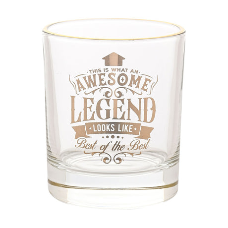Clear glass tumbler with gold rim, featuring gold badge-style print reading "Awesome Legend, Best of the Best," on a plain white background.