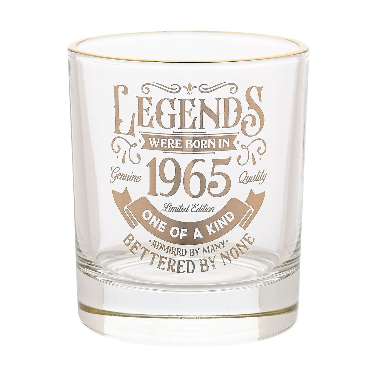 Clear glass tumbler with gold rim and gold "Legends were born in 1965" vintage lettering with scrolling flourishes, shown on a plain white background.