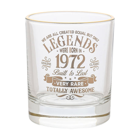 Clear round glass tumbler with a gold rim, featuring gold "Legends Were Born in 1972" print, "Very Rare" ribbon banner, and "Totally Awesome" text, shown on a plain white background.