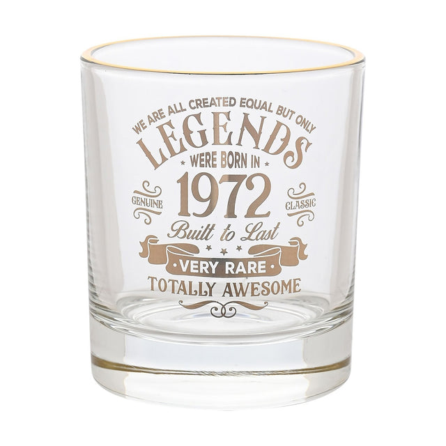 Clear round glass tumbler with a gold rim, featuring gold "Legends Were Born in 1972" print, "Very Rare" ribbon banner, and "Totally Awesome" text, shown on a plain white background.