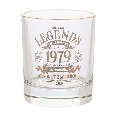 Clear glass tumbler with a gold rim, printed in gold vintage-label style text reading "The Best Legends Were Born in 1979, Absolutely Unique," on a plain white background.