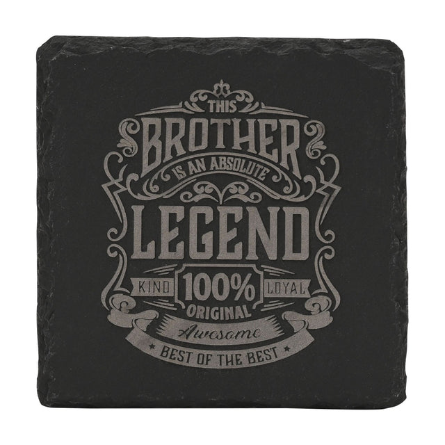 Square black slate coaster with raw edges, featuring grey engraved text "This Brother Is An Absolute Legend, Kind 100% Original Loyal, Awesome, Best Of The Best" on a plain white background.