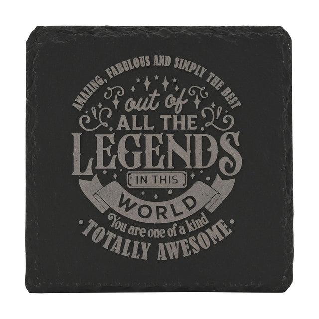 Square black slate coaster engraved in grey with a message calling someone amazing, fabulous, one of a kind, and totally awesome, shown on a plain white background.