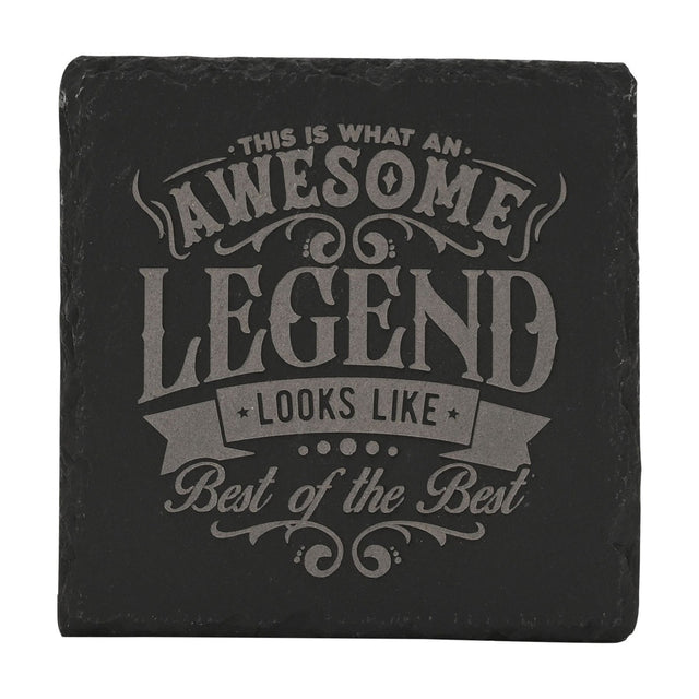 Black square slate coaster with grey engraved text "This is What an Awesome Legend Looks Like, Best of the Best" framed by scrollwork, on a white background.