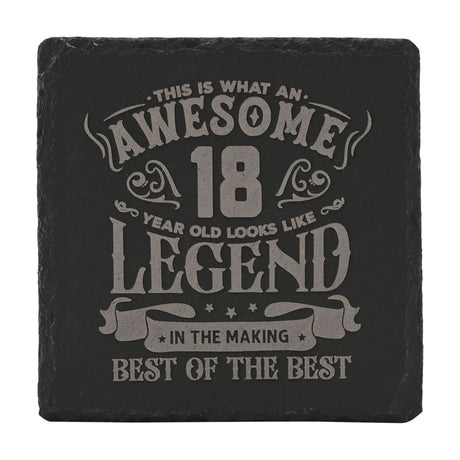 Square black slate coaster engraved with "Awesome 18 Year Old Legend in the Making, Best of the Best" in grey lettering with scrolls and stars, on a white background.