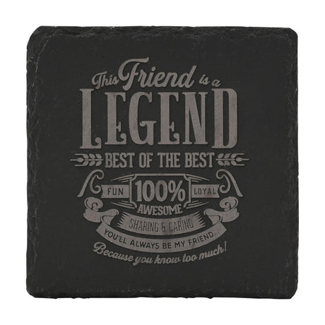 Square black slate coaster etched with "This Friend is a Legend, Best of the Best, 100% Awesome" text in grey vintage-style lettering, shown on a plain white background.
