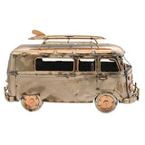 Weathered Campervan Metal Figurine with Surfboard in bronze metallic finish, side view showing roof rack, copper-edged window frames, round headlamps and wheels on a plain white background.