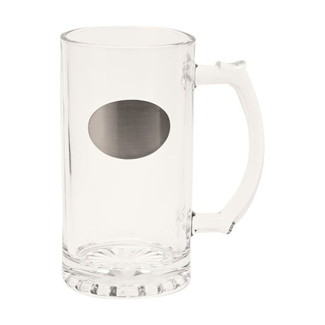 Clear glass tankard beer mug with straight sides, curved handle, silver oval engraving plaque, and a starburst-patterned base, shown on a plain white background.
