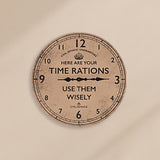 Round wall clock, 30cm, brown crackled face with black numerals, crown emblem and "Here Are Your Time Rations, Use Them Wisely" Civil Defence text, black clock hands.