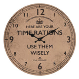 Round 30cm wall clock with crackled brown dial, black numerals and hands, crown emblem, and "Here Are Your Time Rations, Use Them Wisely" Civil Defence slogan text.