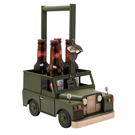 Green metal 4x4-shaped beer caddy with carry handle, "SELF SERVE" bottle opener, mesh grille and round headlamps, holding beer bottles, on a plain white background.